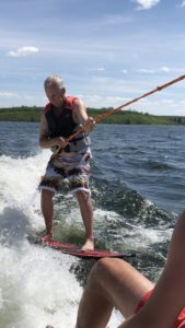 old man holding a rope