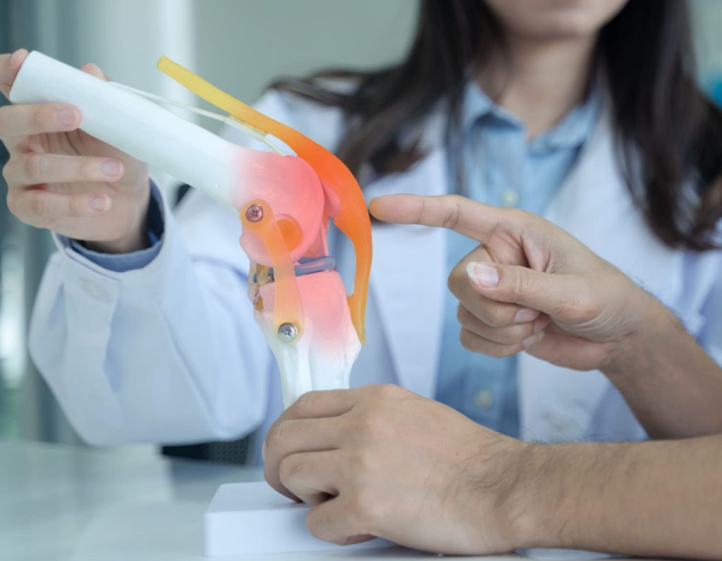 Physician explaining Knee Pain After Hip replacement
